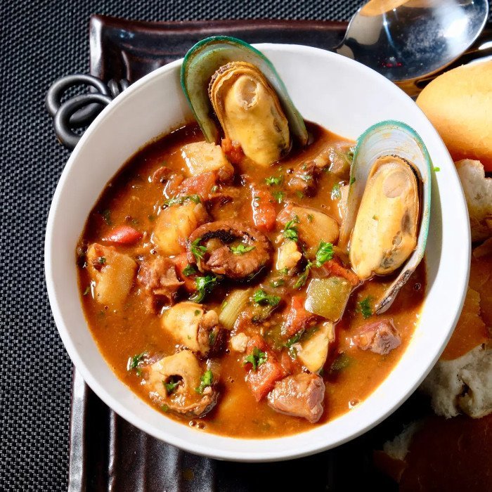 Filé de Peixe Ensopado ao Leite de Coco e Pimentões